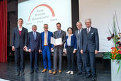 Großes Gruppenfoto: Prof. Dr. Piet Brouwer, Prof. Dr. Hans-Ulrich Reißig, Prof. Dr. Günter M. Ziegler, Prof. Dr. Hannes Bernien, Dr. Tina Klüwer, Prof. Dr. Peter Zoller, Dr.-Ing. Lothar Wilhelmy. (v.l.n.r.)